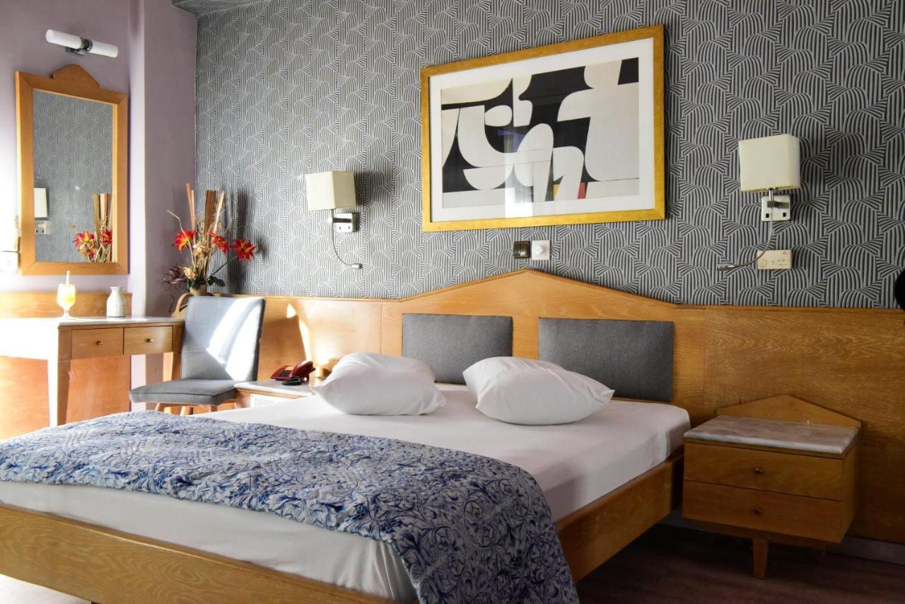 Eva Hotel Pire Dış mekan fotoğraf