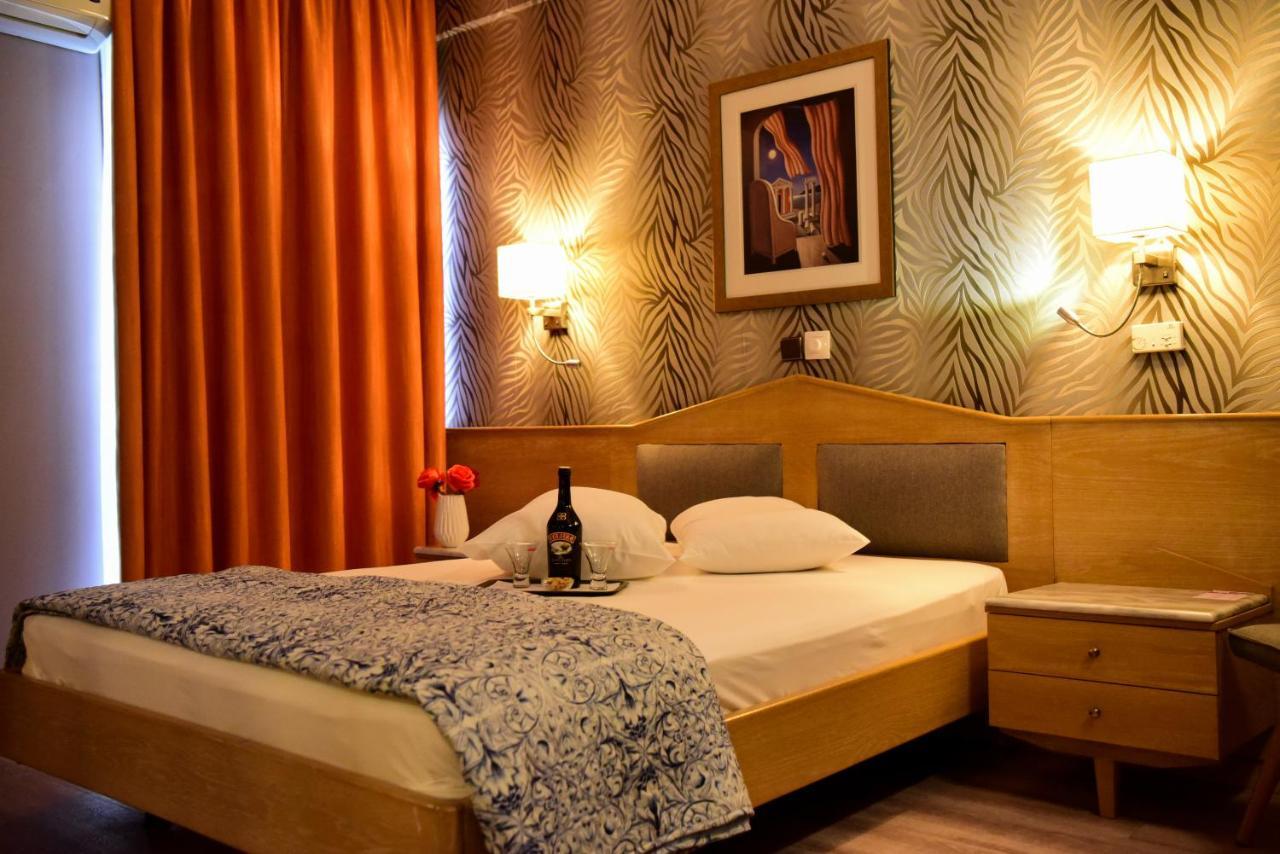 Eva Hotel Pire Dış mekan fotoğraf