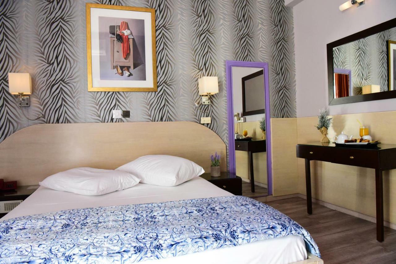 Eva Hotel Pire Dış mekan fotoğraf