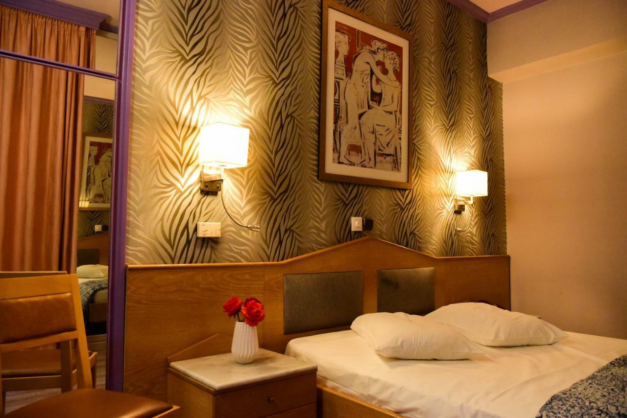 Eva Hotel Pire Dış mekan fotoğraf
