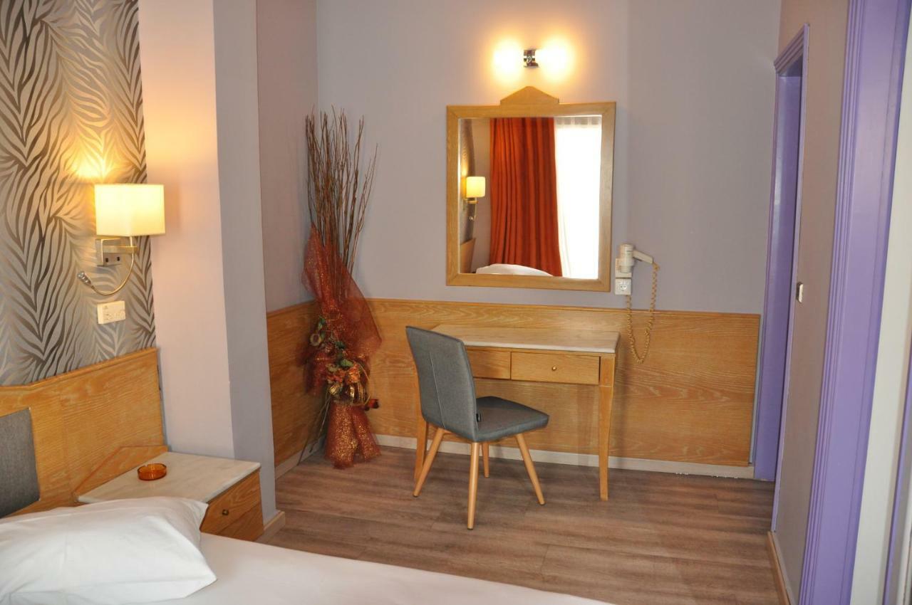 Eva Hotel Pire Dış mekan fotoğraf